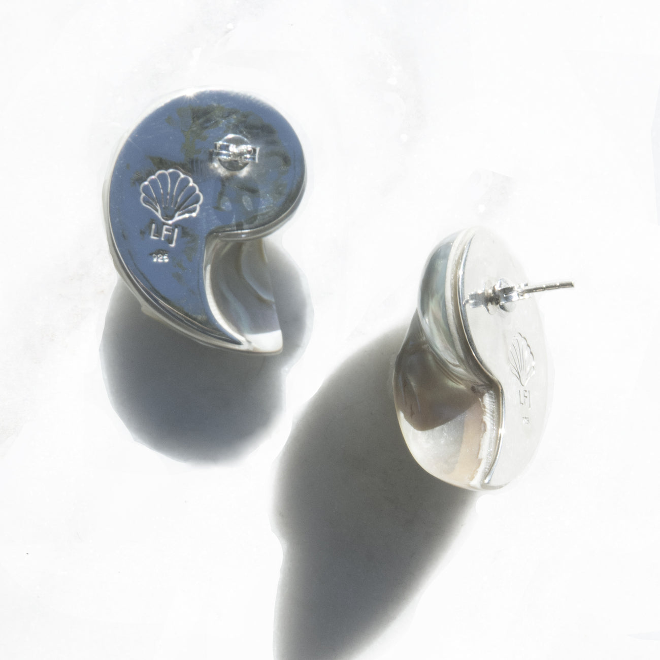 
                      
                        Small Nautilus Shell Earrings
                      
                    