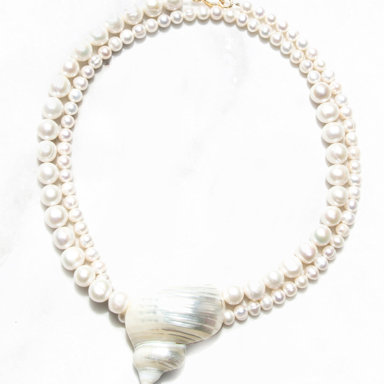 
                      
                        Turban Shell Pearl Necklace
                      
                    