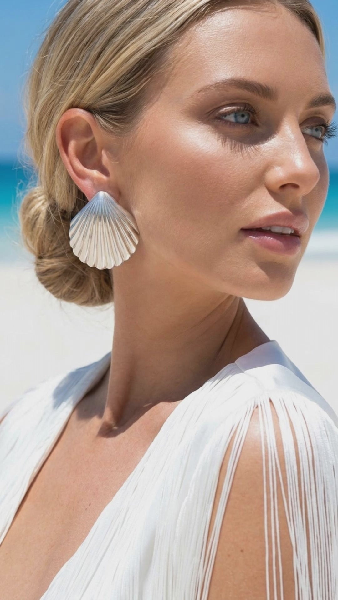 a model wearing a pair vintage oversized 925 silver shell earrings | Lily Frank Jewelry 