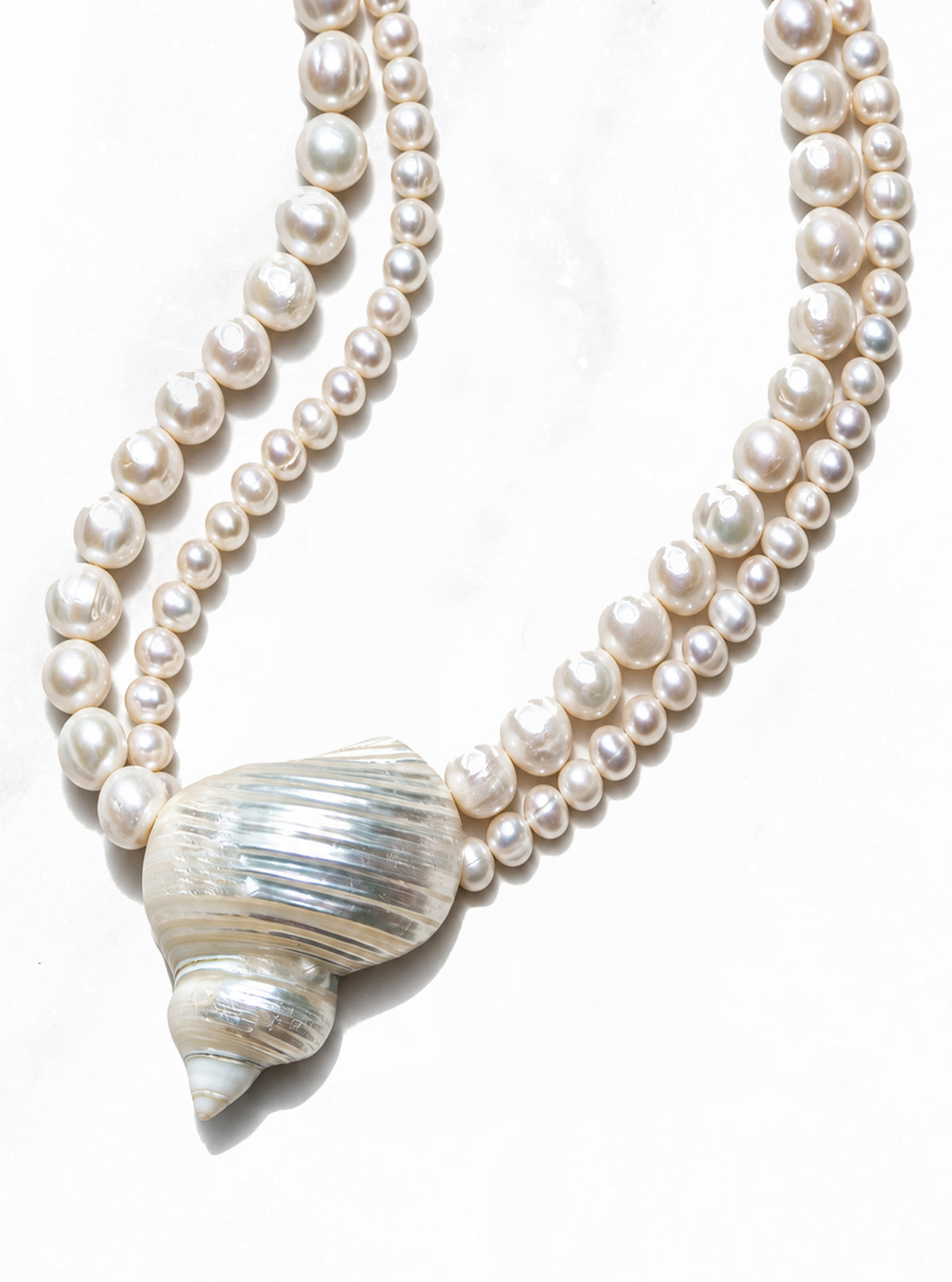 Turban Shell Pearl Necklace with a large natural turban shell centerpiece and two strands of freshwater pearls | Lily Frank Jewelry