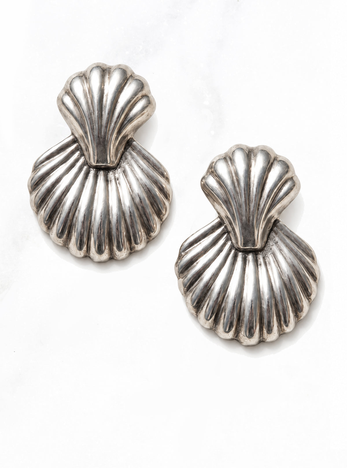 Vintage 925 Silver Sculptural Shell Earrings with layered, ridged silver shell shapes on a white background | Lily Frank Jewelry
